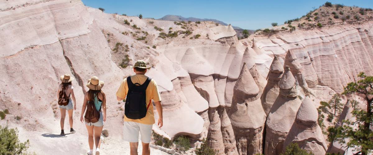 Family on hiking trip in beautiful mountains.Kasha-Katuwe Tent Rocks National Monument, Close to of Santa Fe, New Mexico, USA