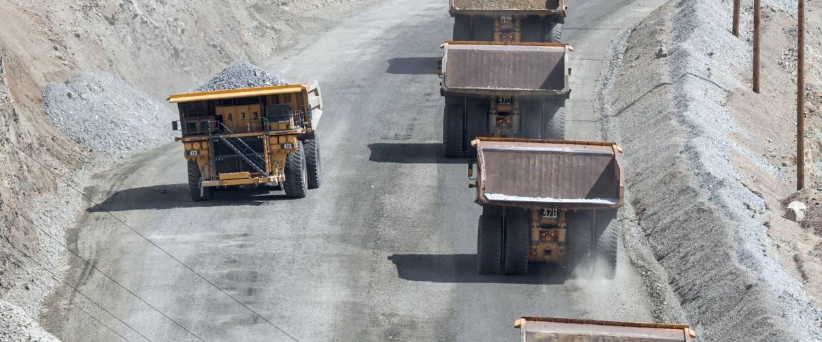Salt Lake City, UT/USA - circa August 2011: Huge ore trucks transporting ore at Kennecott Copper Mine in Salt Lake City, Utah