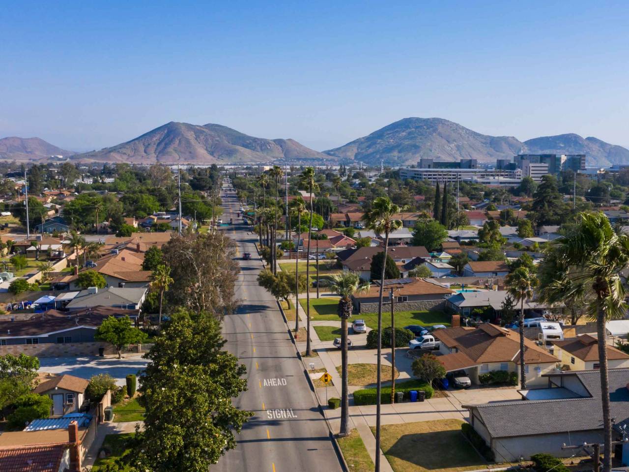 Daytime aerial view of the city center of Fontana, California.