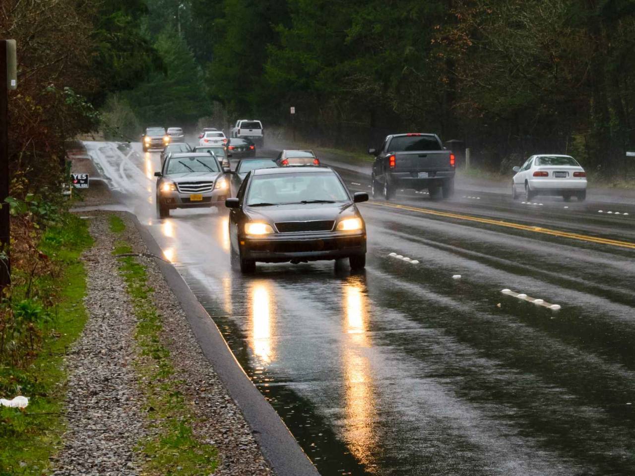 Wet roads during a Typical commuting traffic in the Puget Sound region of Seattle Tacoma in the Pacific Northwest of the United States