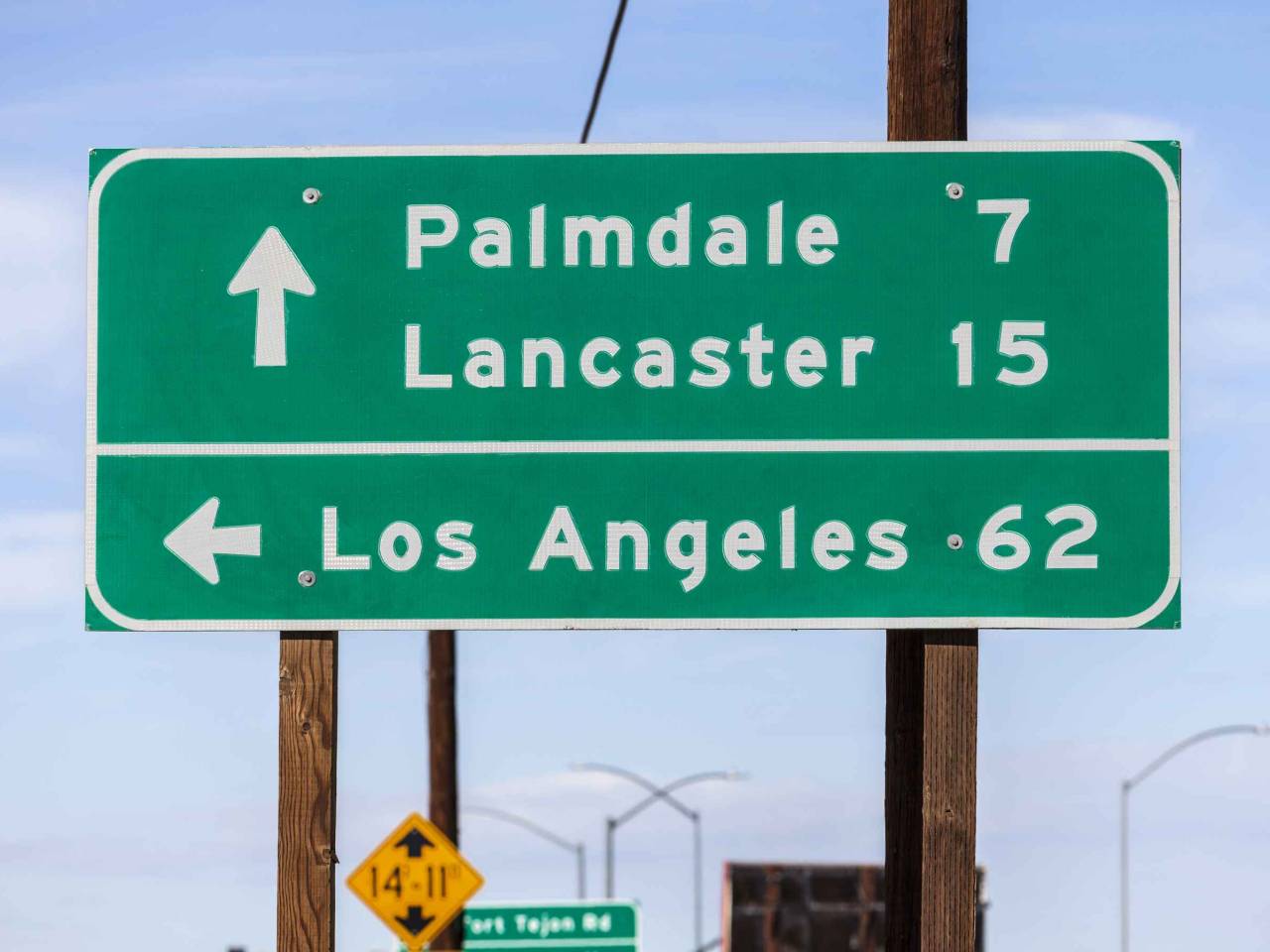 Los Angeles, Palmdale and Lancaster highway sign in California's Mojave desert.