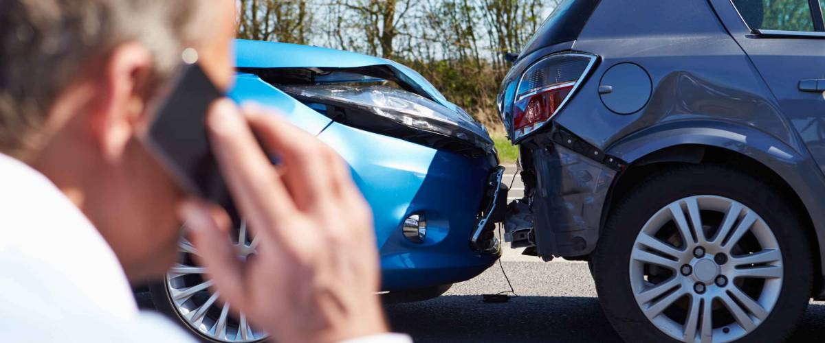Driver Making Phone Call After Traffic Accident