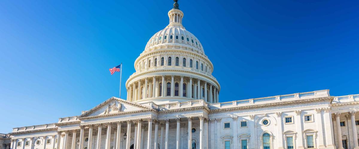US Capitol over blue sky