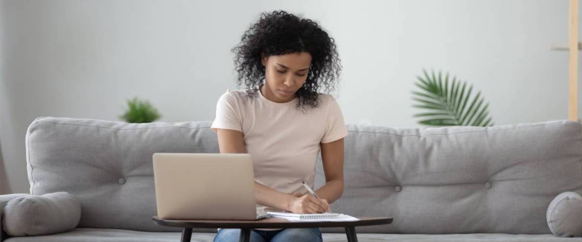 Woman writing.