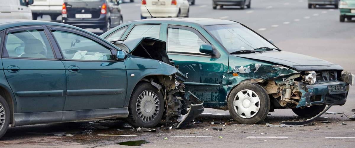 car crash accident on street, damaged automobiles after collision in city