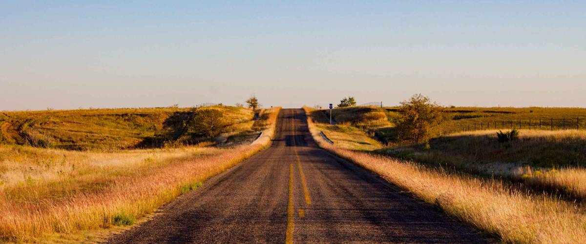 endless road of the state of Texas in the United States at sunset
