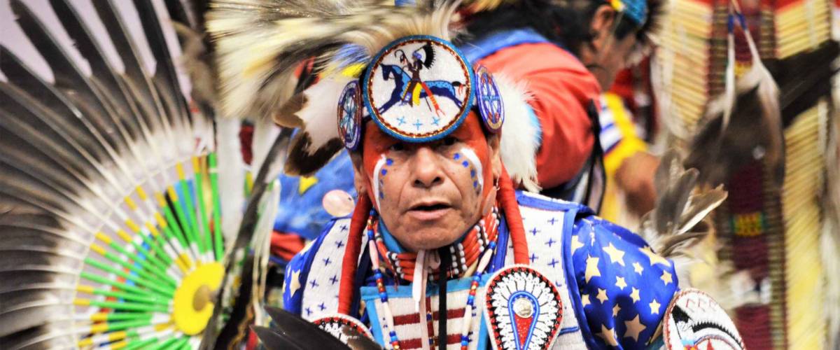 10/11/2015 - Rapid City, South Dakota - a Senior Men's Traditional Dancer competes in a dance special at the Black Hills Powwow held at the Rushmore Plaza Civic Center.