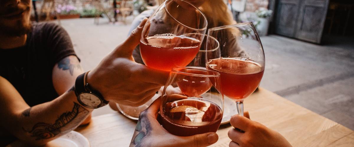 friends celebrating with wine / hanging out