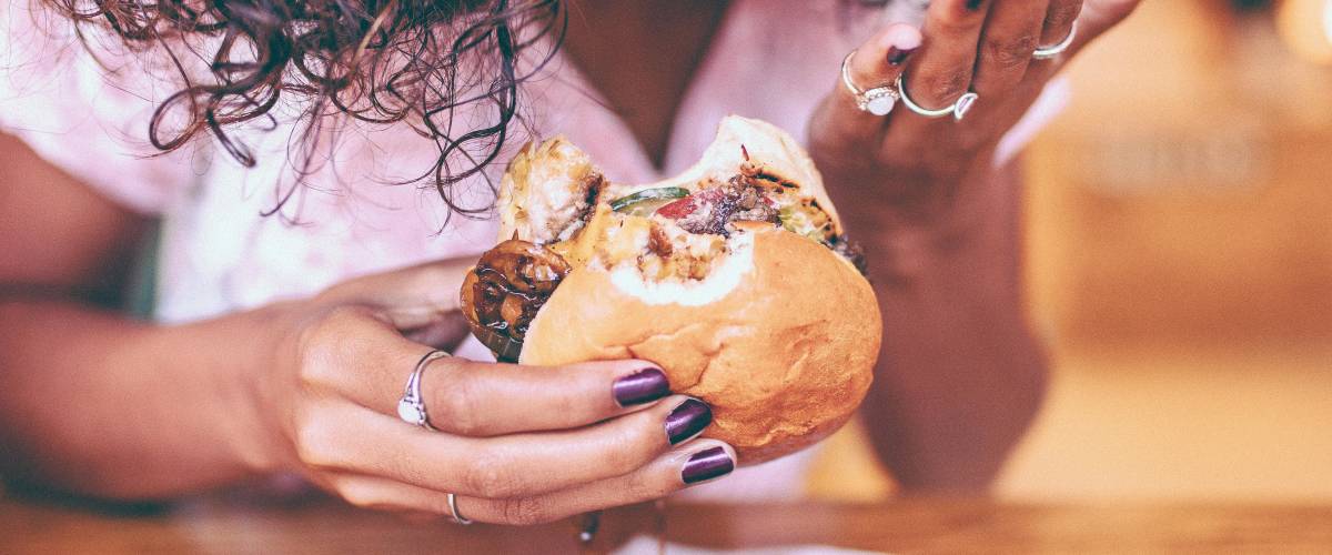 woman eating a burger