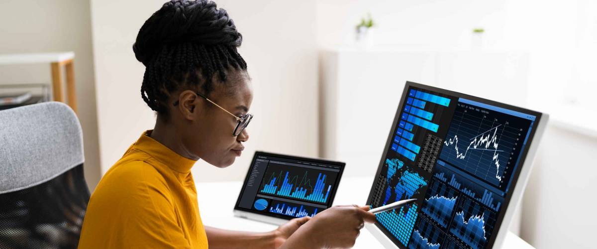 African American Business Data Analyst Woman Using Computer