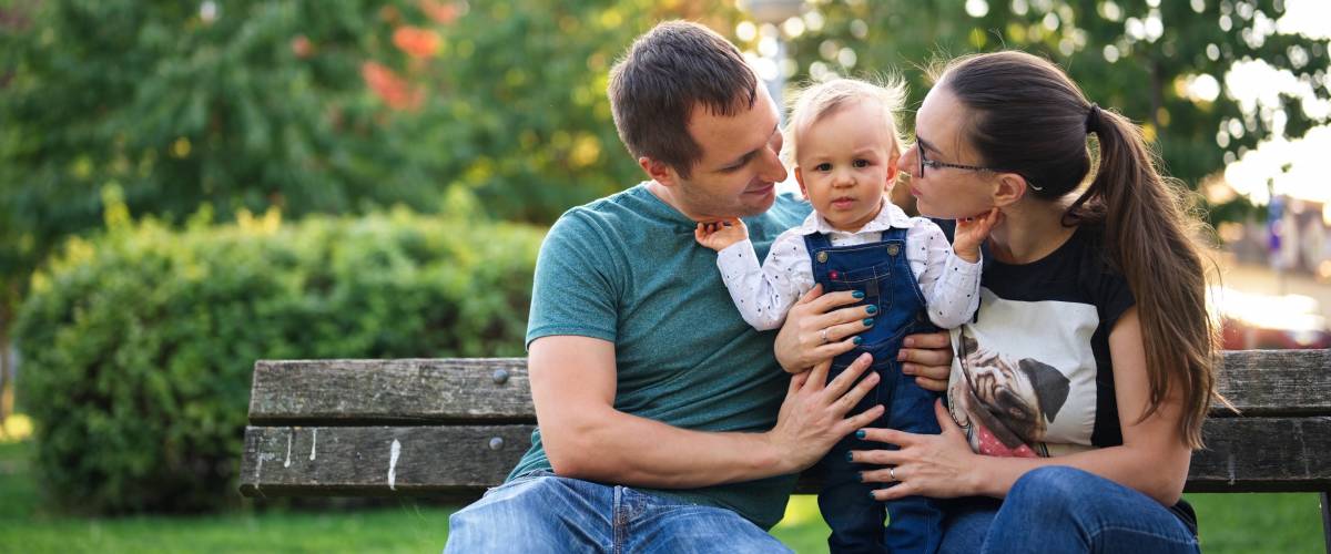 Family on park bench