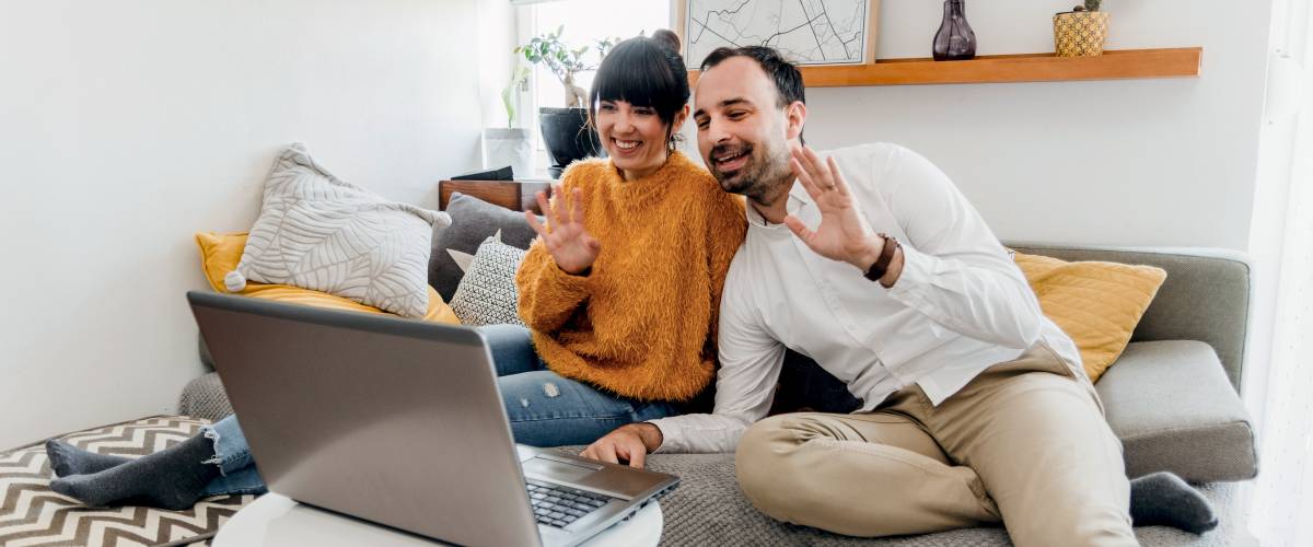 Couple waves on video call