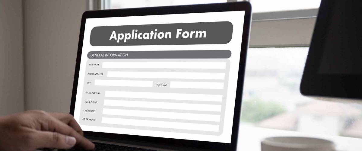 business man working on laptop computer use Online Web Job Application Form moniter