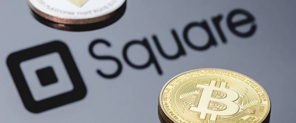 A bitcoin with the Square company logo