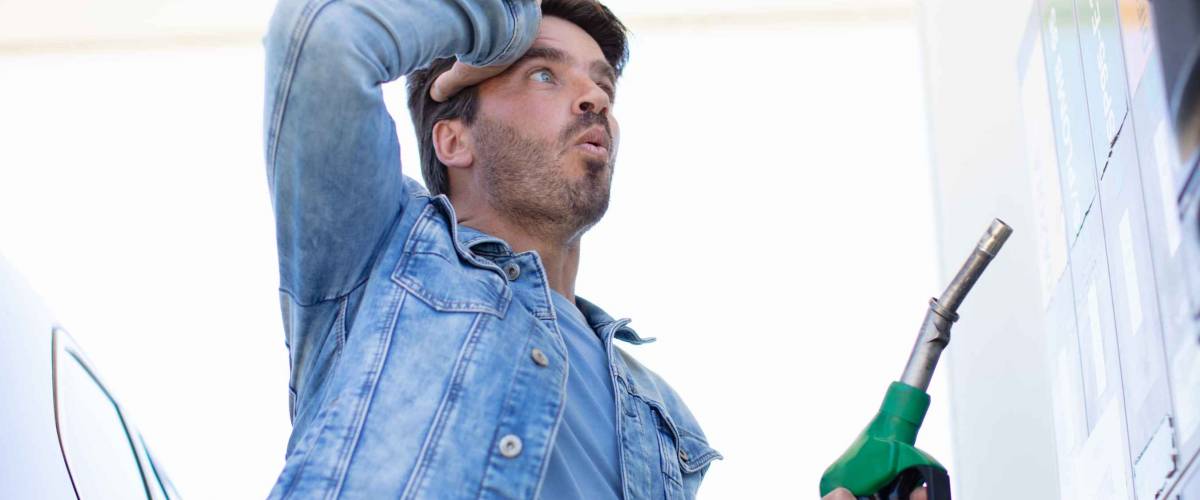 man in shock with gas price
