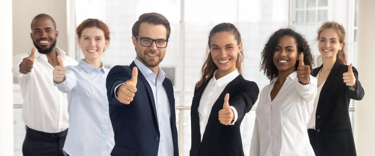 Business leaders with employees group showing thumbs up looking at camera, happy professional multicultural office team