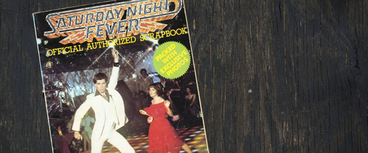 London, England - June 15, 2017: Saturday Night Fever Official Authorized Scrapbook from the film launched in 1977, Starring John Travolta and Karen Lynn Gorney