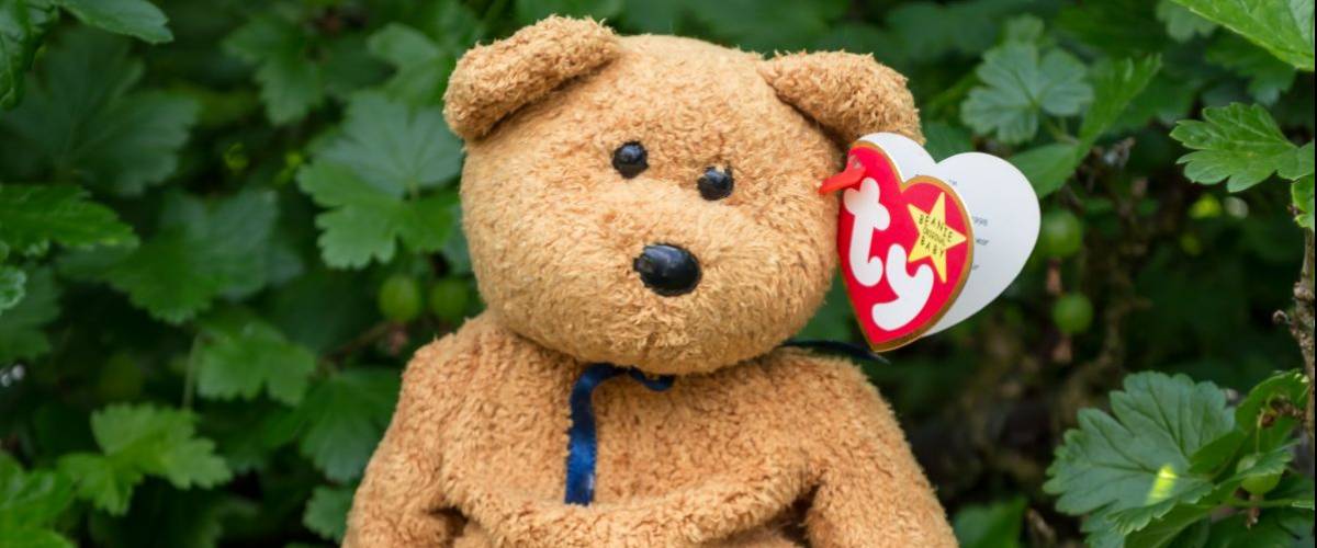 WREXHAM, UK - MAY 31, 2015: Collectible Ty Beanie Baby, Fuzz the bear. Birth date July 23 1998