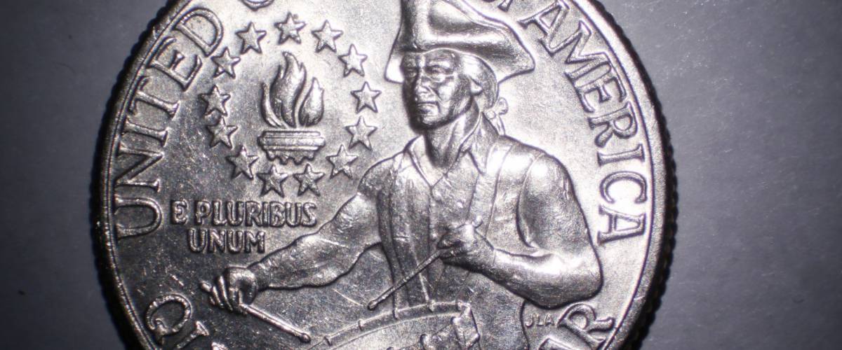 1976 US Quarter. .25 cent piece from the year 1976 representing the Bicentennial of the USA - 1776 - 1976. Minted for one year these quarters are now collector items.