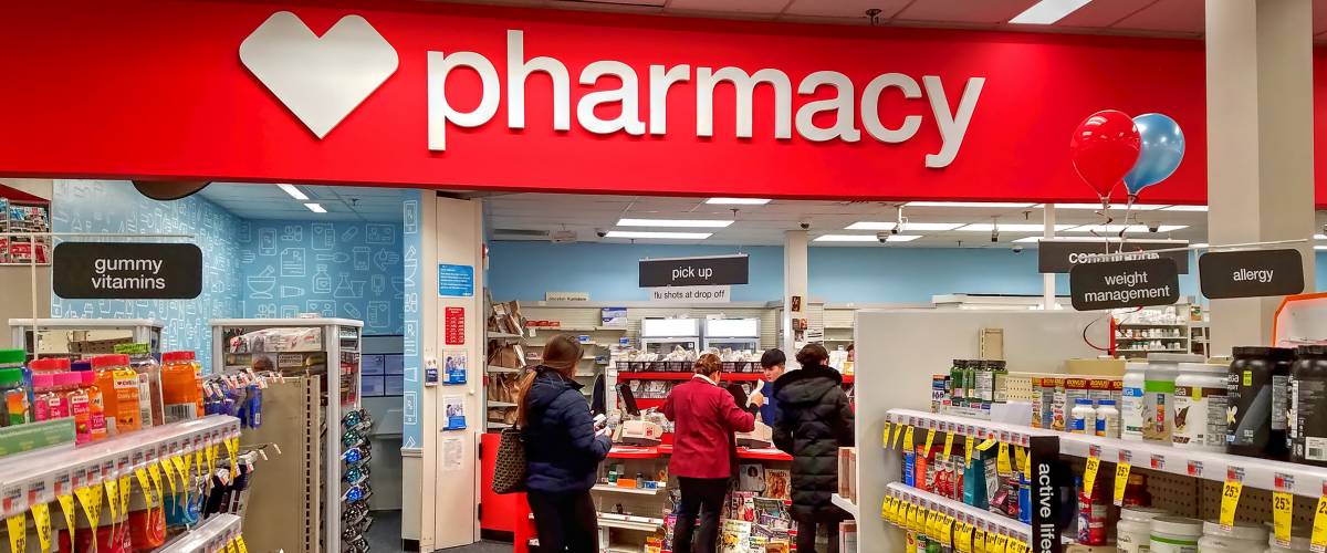 People waiting in line at a CVS Pharmacy