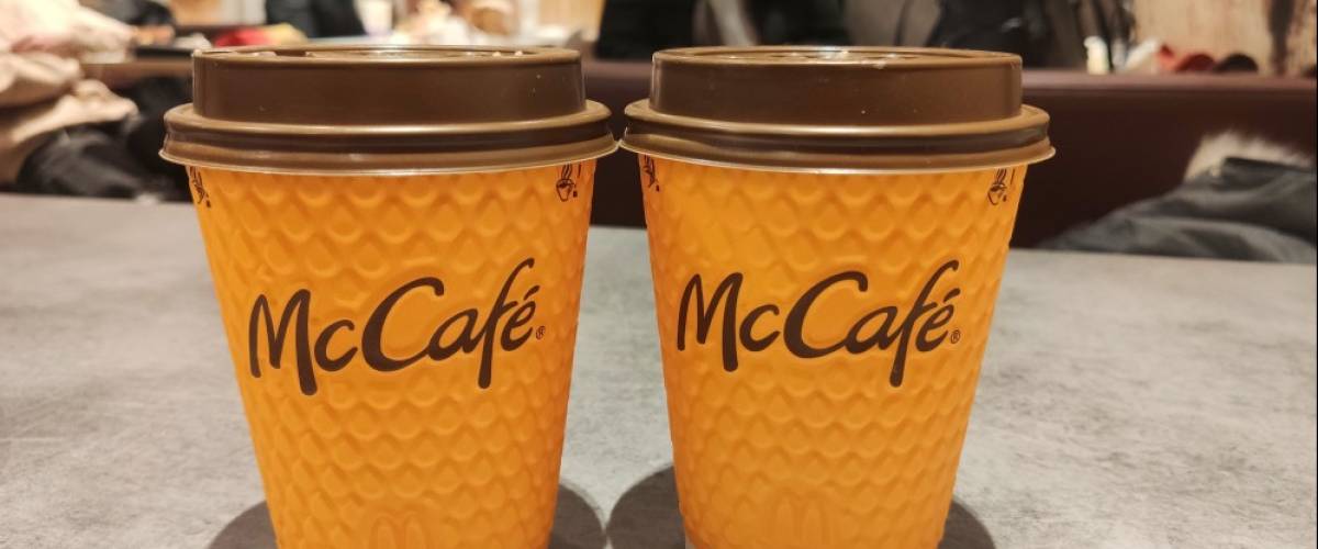 Two McDonalds coffee cups