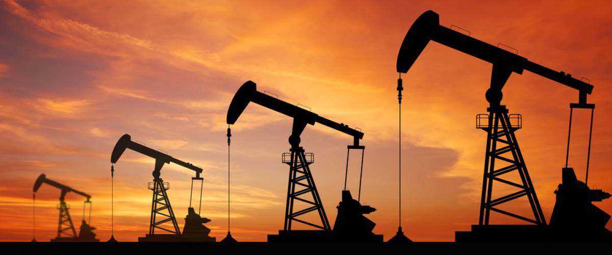 Oil pump oil rig energy industrial machine for petroleum in the sunset background for design
