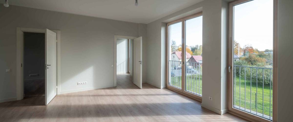 Modern light interior of spacious room in apartments residential townhouse.
