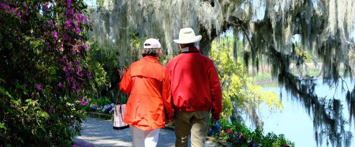 Elderly couple in Magnolia Plantation and Gardens, Charleston, South Carolina, US