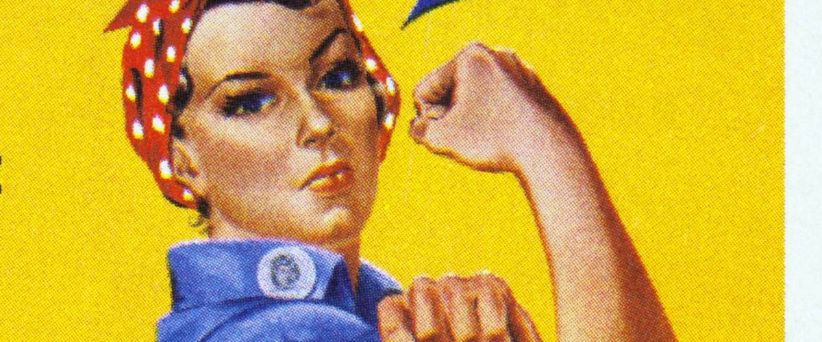 UNITED STATES CIRCA 1999 : Canceled USA. postage stamp showing an image of Rosie The Riveter commemorating the American woman who worked in factories during the World War II, circa 1999.