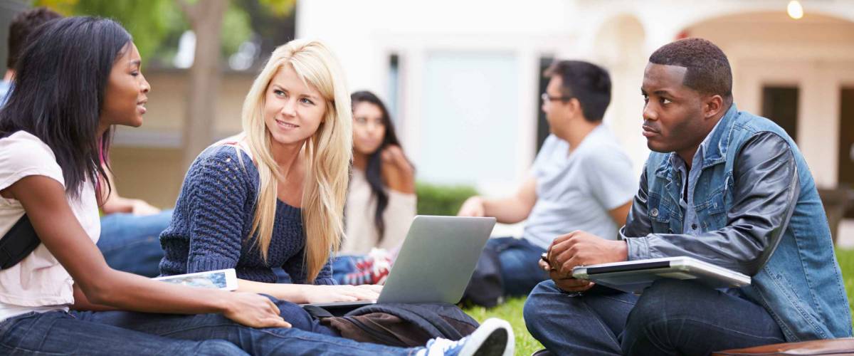 Group Of University Students Working Outside Together