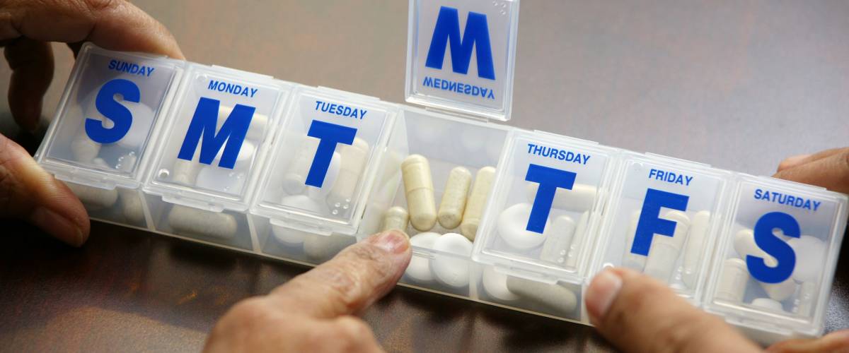 People getting ready to take their pills