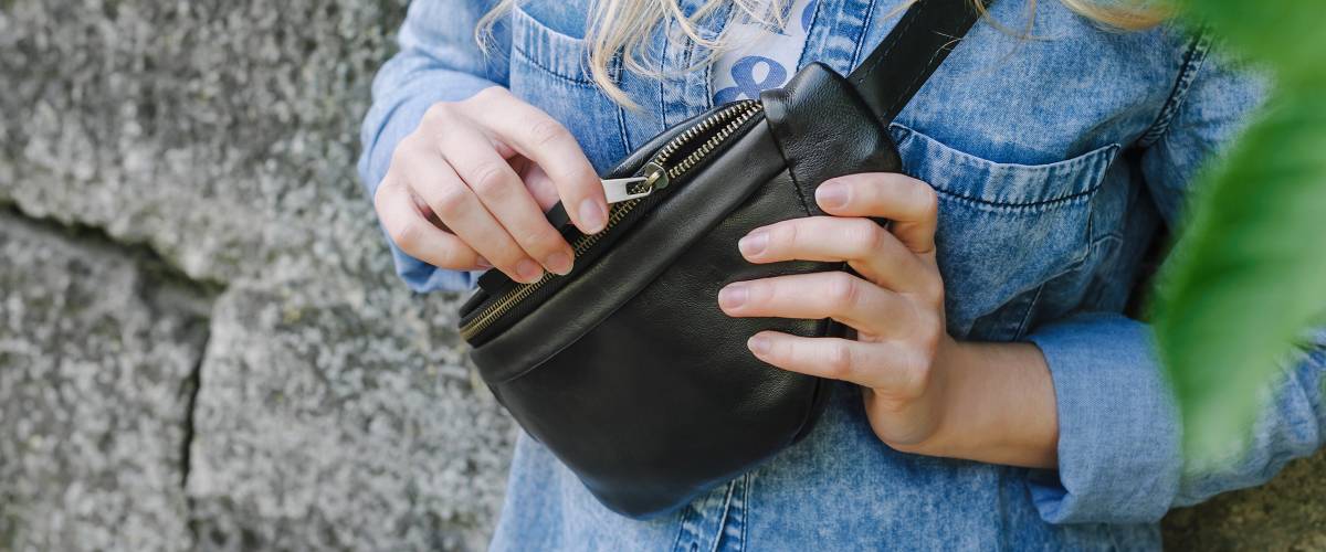 Woman wearing fanny pack across chest