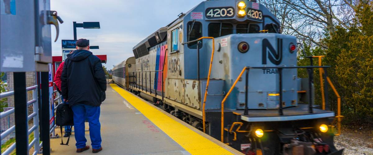 New Jersey / USA - April 12, 2018 : people waiting to get in NJ train at Absecon station which can travel to Philadelphia