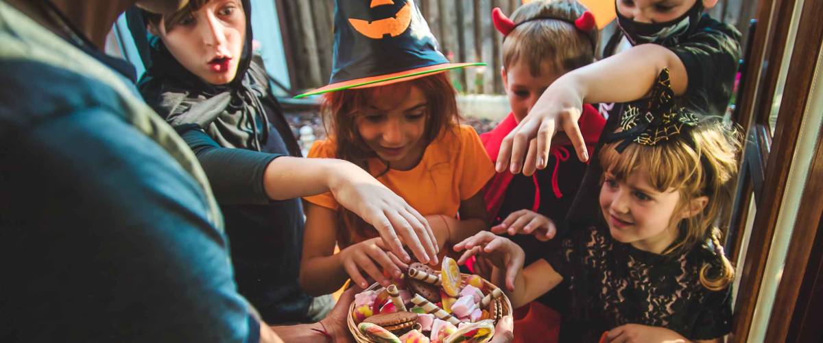 Children celebrate Halloween dressed up in costumes. Selective focus. Kids.