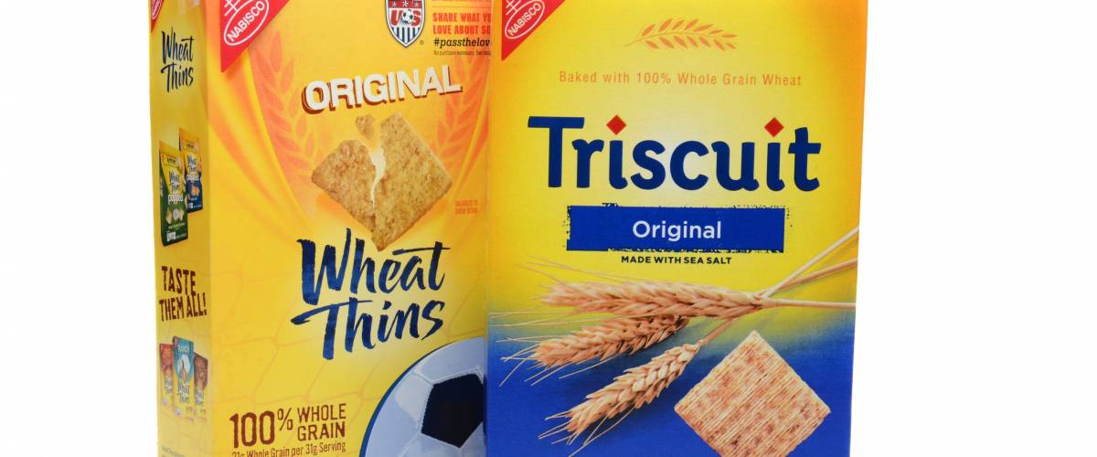 IRVINE, CA - SEPTEMBER 08, 2014: Boxes of Nabisco Wheat Thins and Triscuit Crackers.