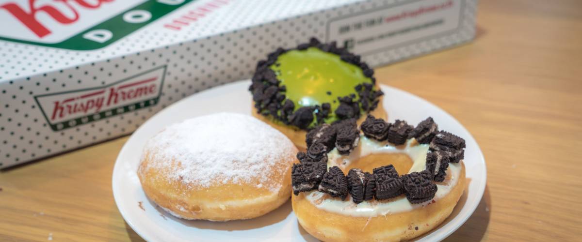 BANGKOK, THAILAND . DEC 03,2017 .Close up assorted Krispy Kreme donuts with chocolate frosted, pink glazed.Selective focus