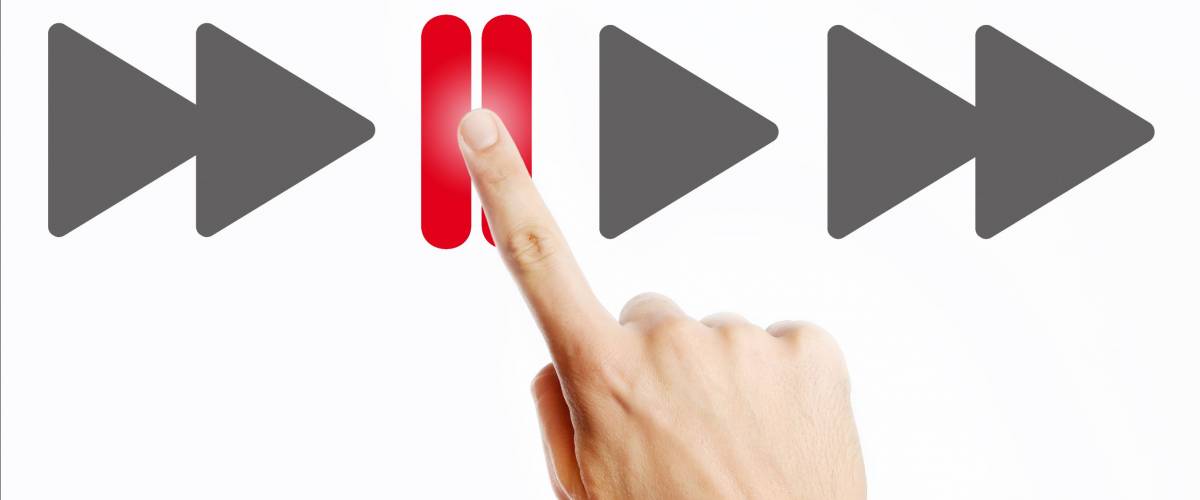 Pause, Male hand pressing pause button on the virtual screen