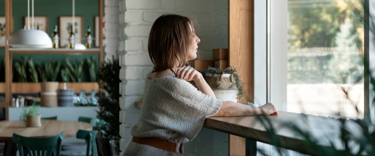 Young woman at restaurant alone