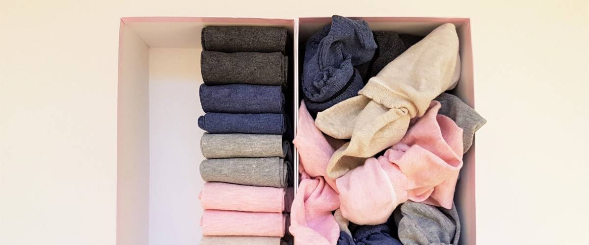 Neatly organized and not so organized socks