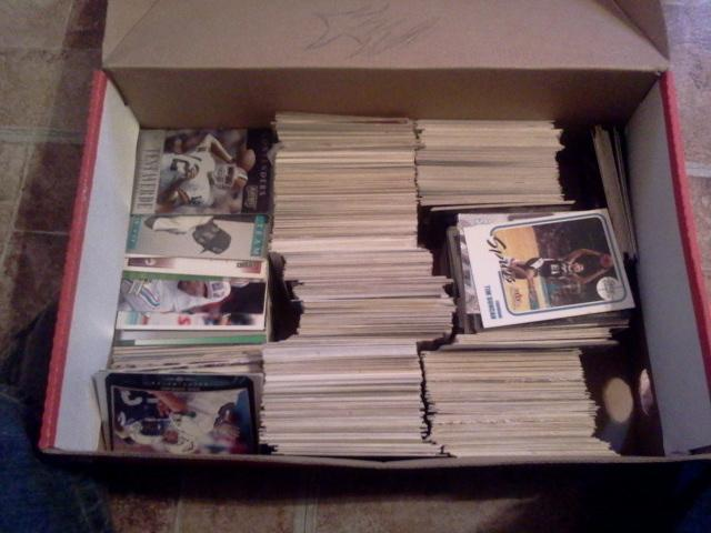 Various sports cards in a box