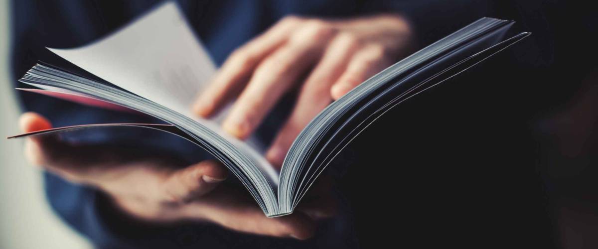 man reading a magazine