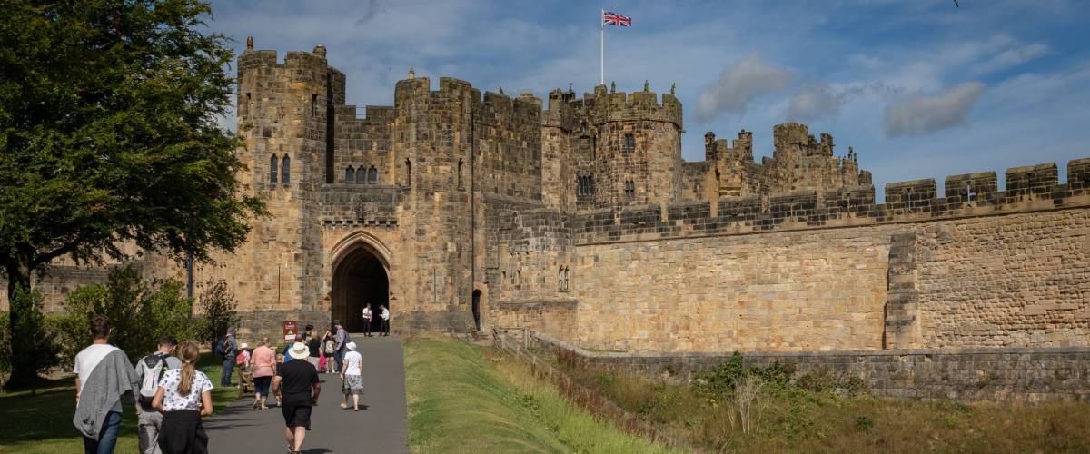 Alnwick, UK - July 31, 2018: Alnwick Castle - the seat of the Duke of Northumberland, the second largest inhabited castle in England. The castle is open to the public throughout the summer