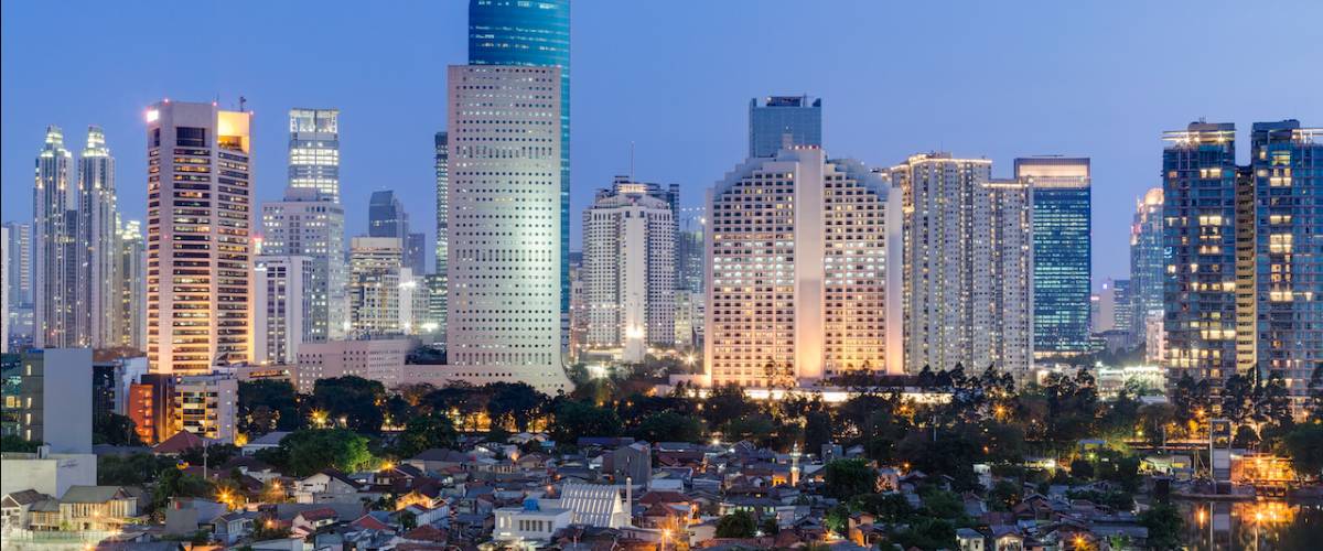 Jakarta downtown skyline with high-rise buildings at sunset