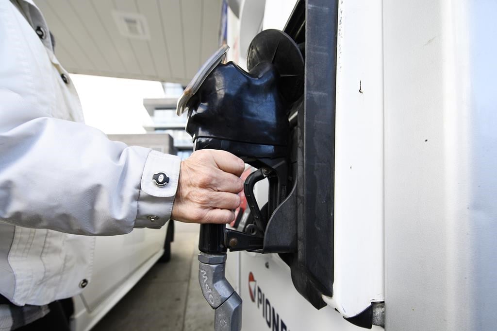 Eastern Canada provinces are going through a sticker shock of gas price hikes, with cars lining up at gas stations to get what they can before the price changes take effect. A person fills up