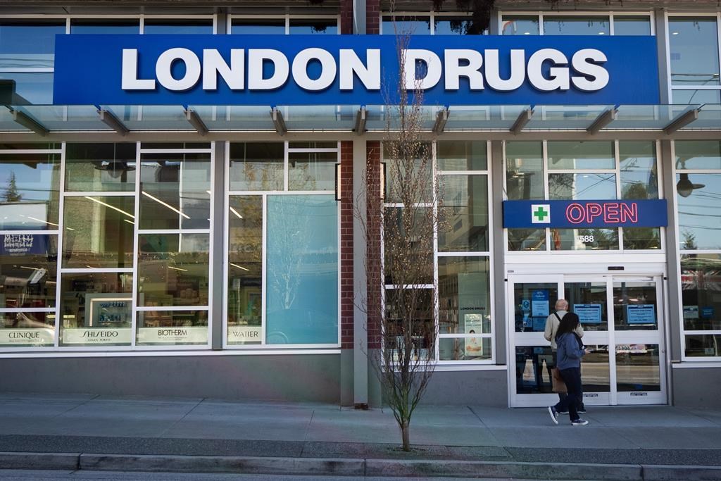 People wait outside of the London Drugs Dunbar location on Monday, April. 29, 2024. London Drugs says its phone lines are operational again after being taken offline in response to a cybersec
