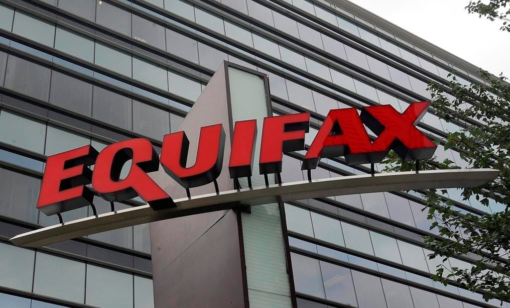 Equifax Canada says it&#039;s exploring how using payday loan data could affect people&#039;s credit scores. Signage is seen at the corporate headquarters of Equifax Inc. in Atlanta, Saturday, July 21,