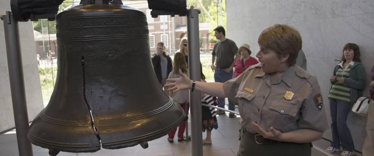 MAY 2007 - A National Park Ranger explaining the crack in the Liberty Bell in Liberty Bell Center, Philadelphia, Pennsylvania
