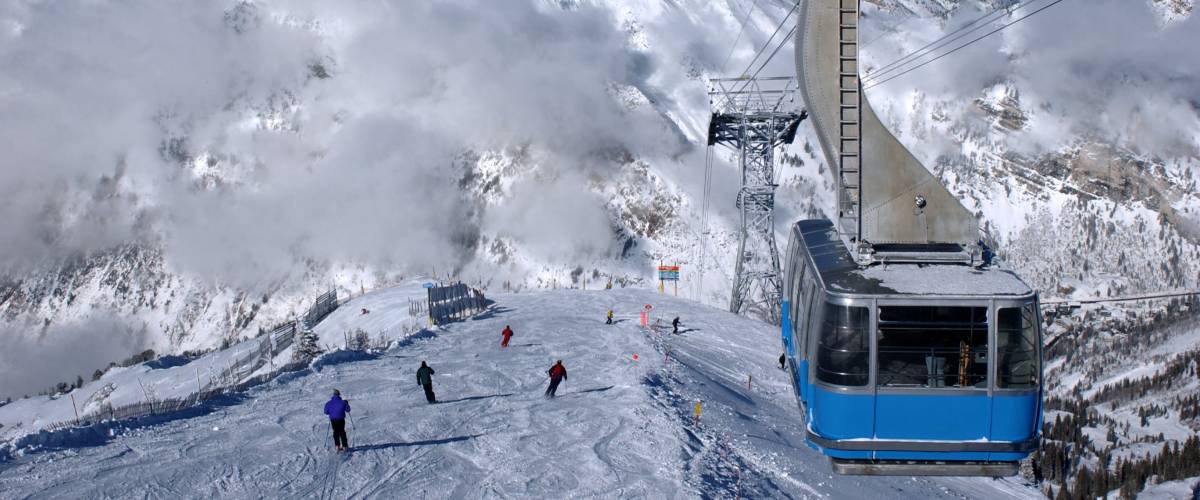 Spectacular view to the mountains and blue ski tram at Snowbird ski resort in Utah