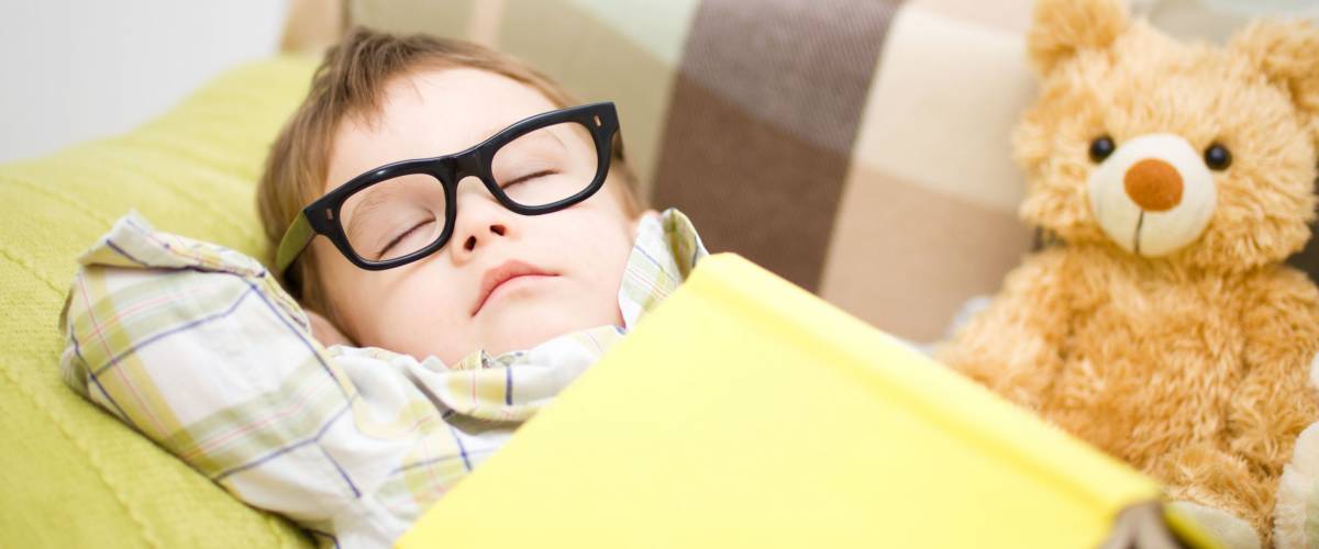 little boy taking a nap