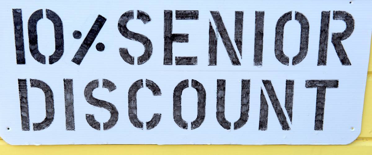 Horizontal photo of sign offering seniors a discounted price